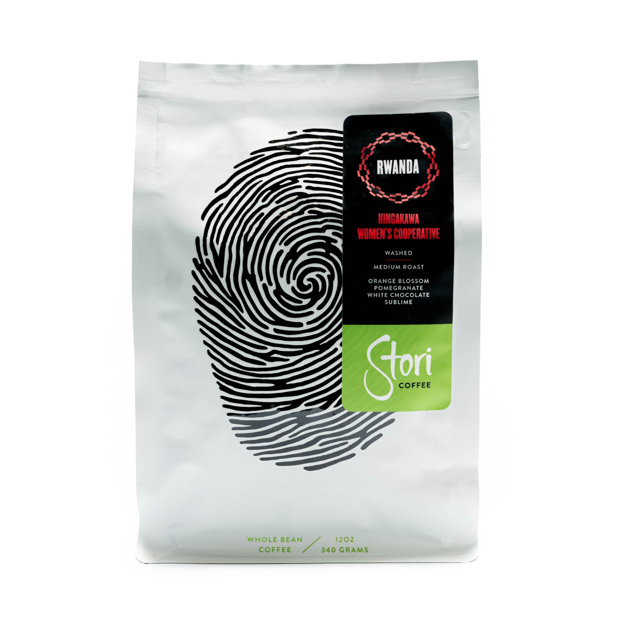 This picture shows an image of the front of our Single Origin Rwanda Coffee Bag. The bag is white with a black thumb print to symbolize our global connection. 