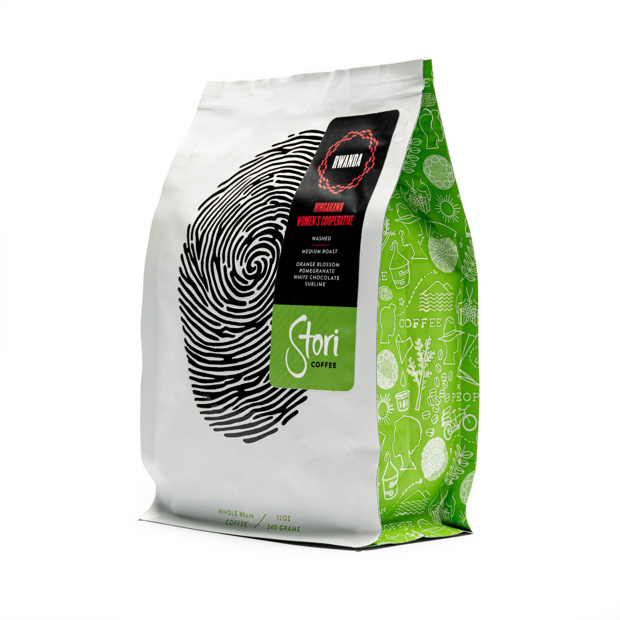 This picture shows an image of the side of our Single Origin Rwanda Coffee Bag. The bag is white with a black thumb print to symbolize our global connection. On the side are illustrations of the ways that coffee connects us. 